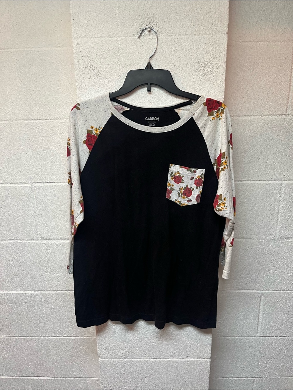 Carbon Black Raglan Top with Floral Sleeves and Pocket